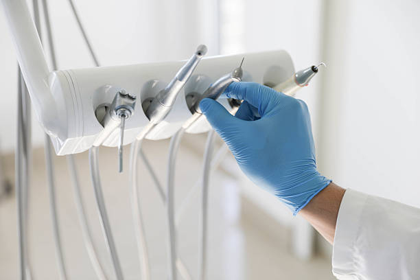 Professional Tooth Extraction technician working in Albers, IL